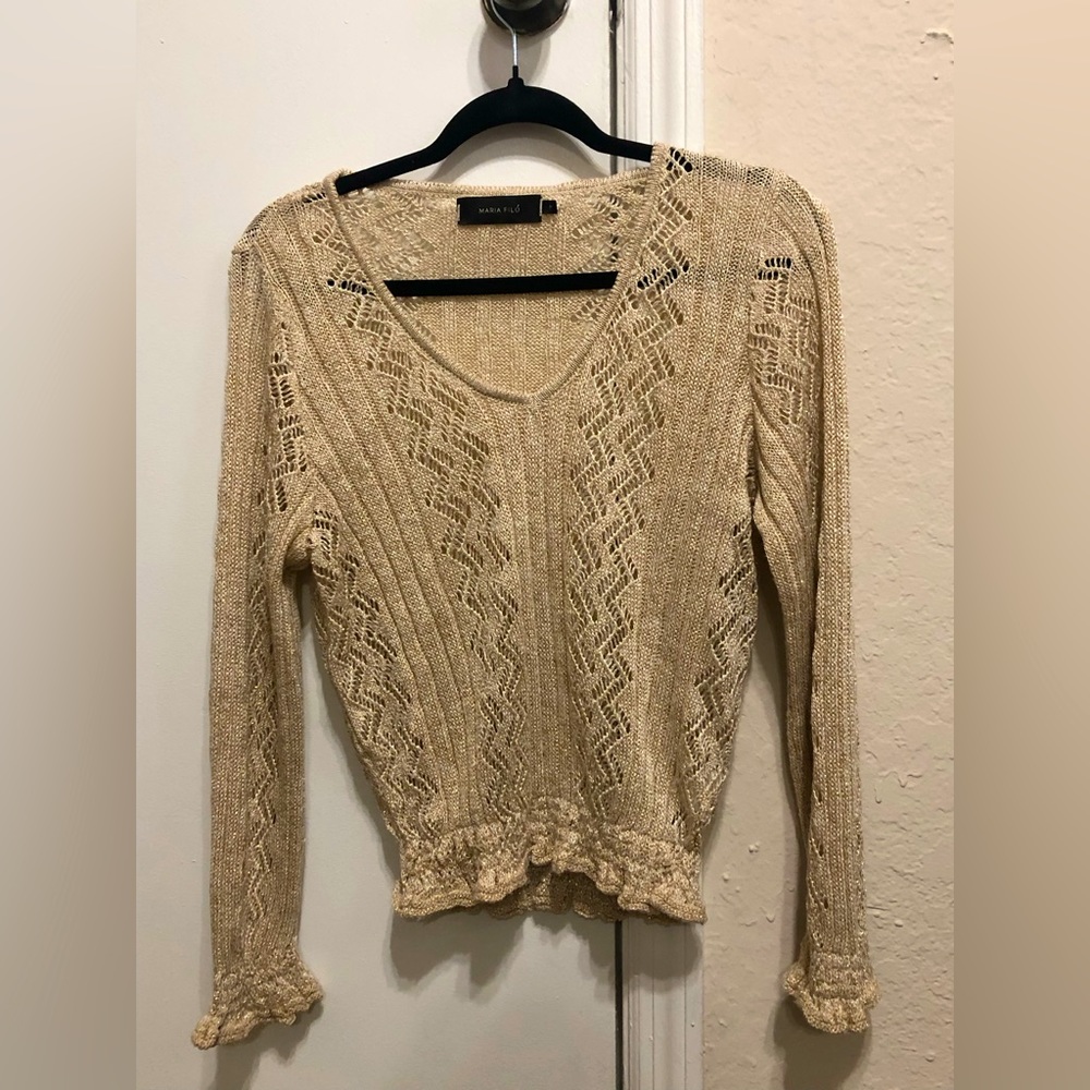 Has a little bit of sparkle. It comes with a top to wear together.